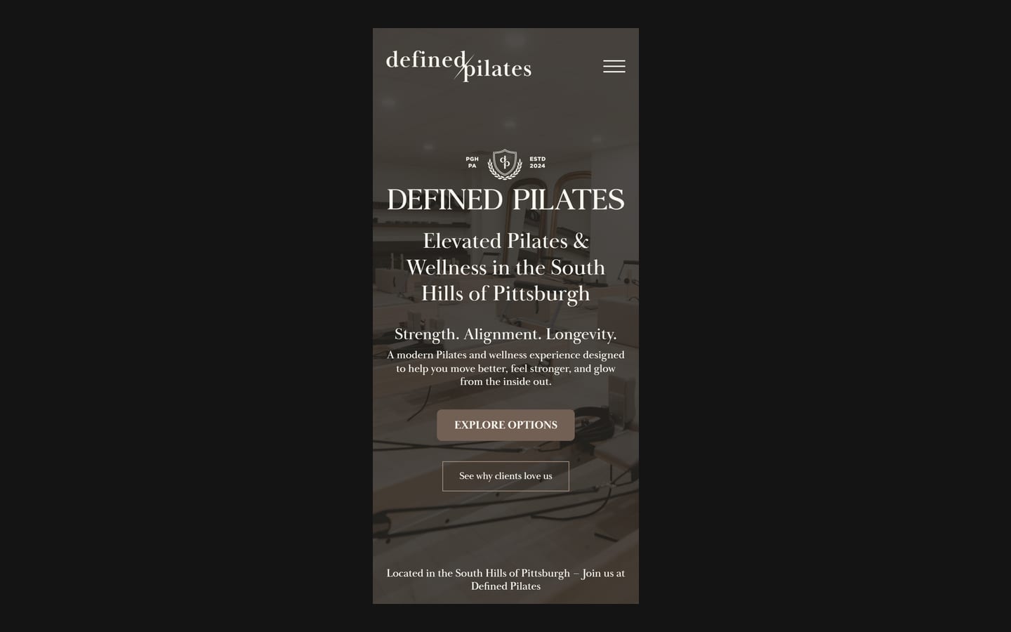 Defined Pilates homepage on a phone